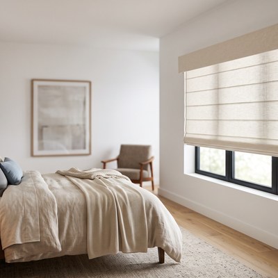 Roman Shade in flat fold style installed in a bedroom